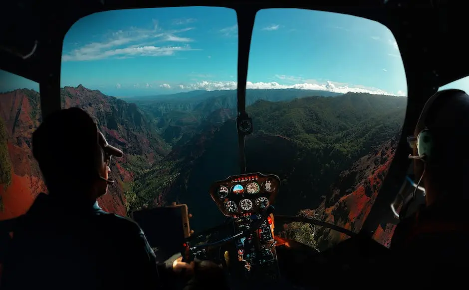 Helicopter cockpit view over a mountain canyon