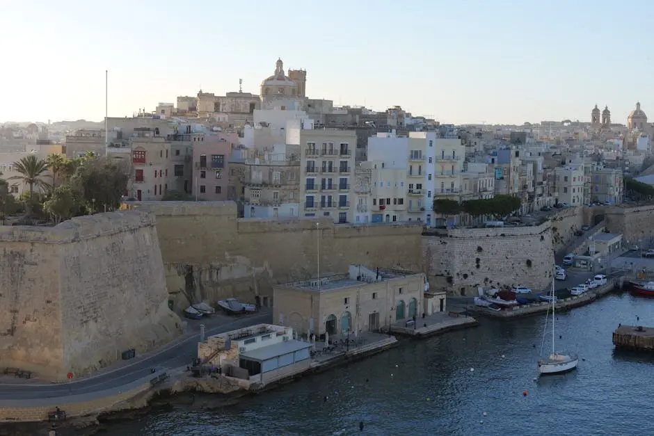Historic limestone town above a small harbour on Malta