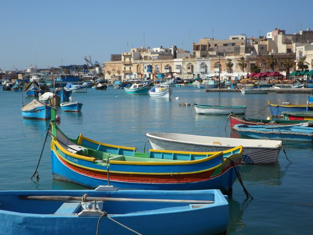 Luzzu fishing boats in the harbour of Marsaxlokk, Malta