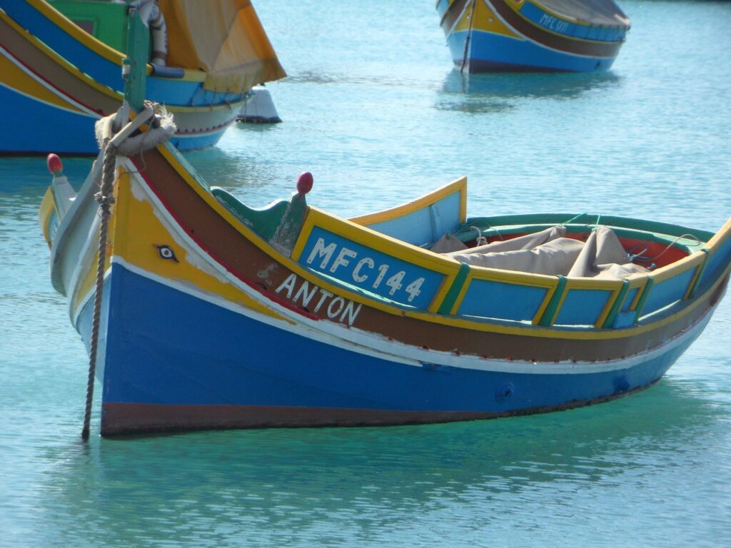 Luzzu fishing boats in the harbour of Marsaxlokk, Malta