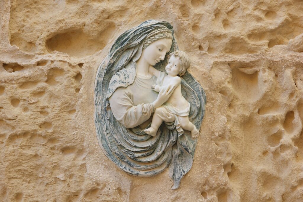 Religious statue on a church facade in Mdina, Malta