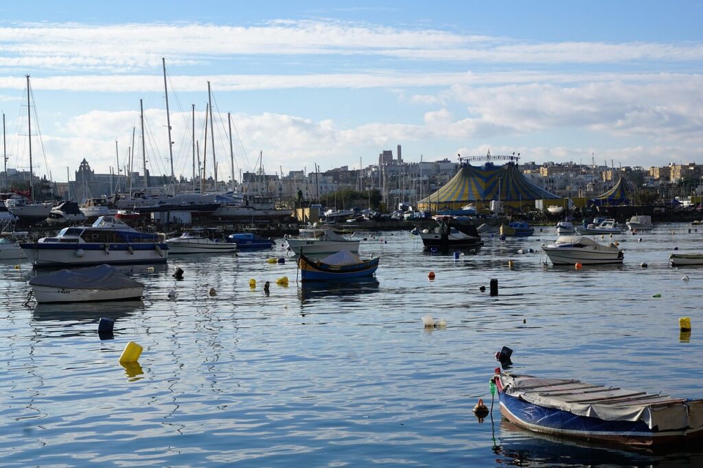 Sliema seafront with sailing boats on the water, Malta