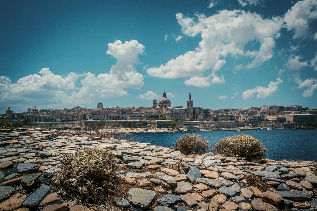 Valletta skyline with church domes seen across the harbour, Malta